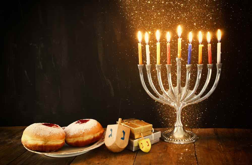 hanukkah-menorah-jelly-donuts-dreidels-Depositphotos_86761900_S